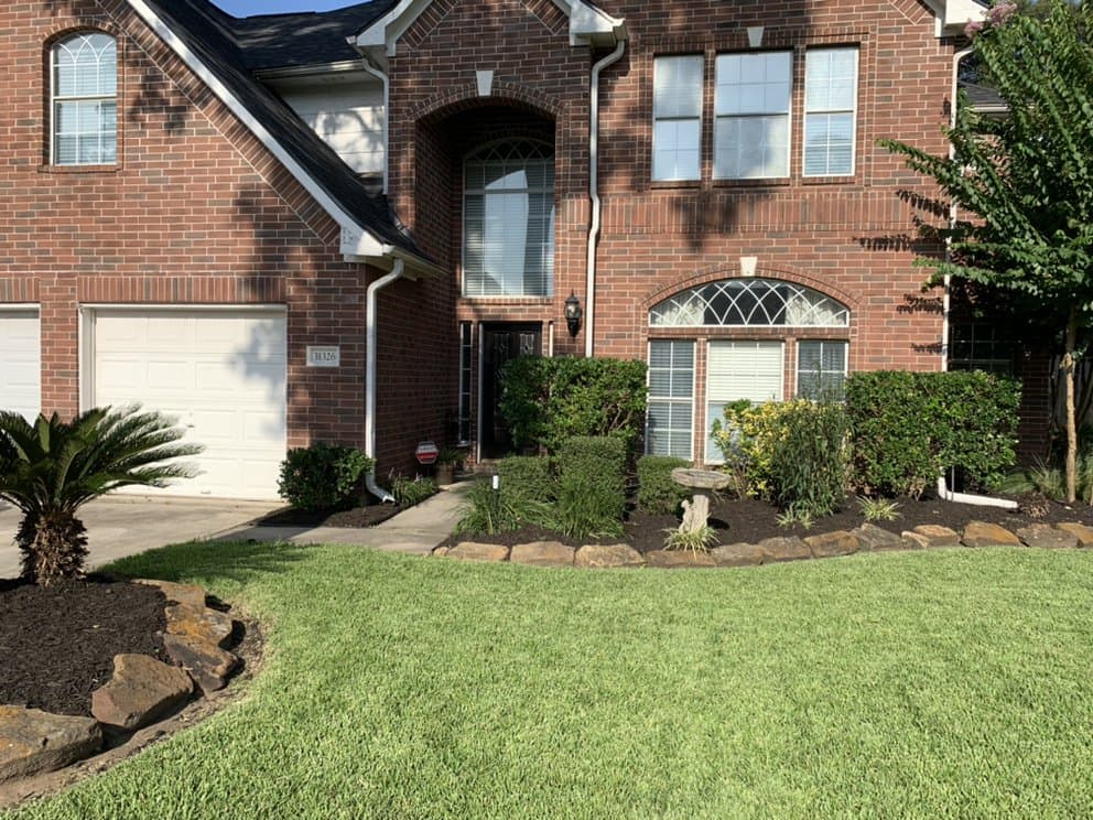 Well-maintained landscaping at a large Houston property
